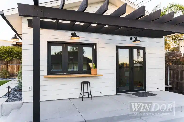 windor-justin-mcchcesney-8-3750-folding-window-and-french-swing-door-black-exterior-f658c6e6-1920w